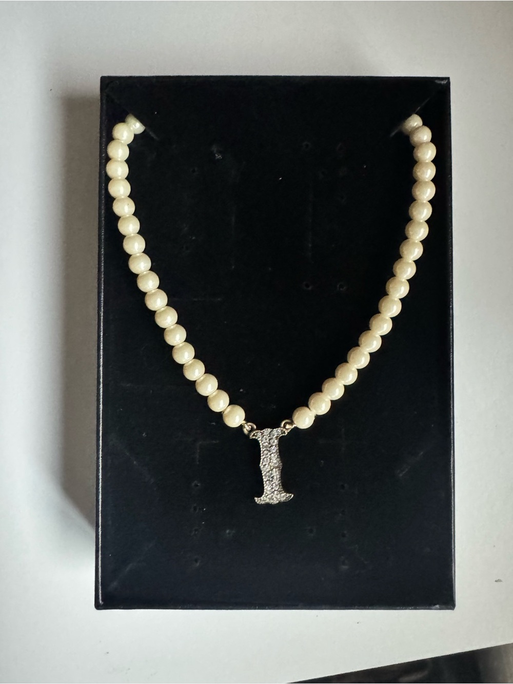 Heidi Daus Ivory Pearl Necklace with Pave 'I' Pendant